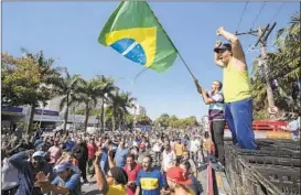  ?? SEBASTIAO MOREIRA/EPA-EFE/REX/SHUTTERSTO­CK ?? fills a street Monday in Sao Paulo as a nationwide truckers strike that has caused shortages of food, fuel and other goods reached its eighth day. Brazilian President Michel Temer announced concession­s late Sunday but the walkout continued.