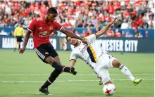  ?? Jae C Hong / AP ?? Having put on muscle in the off-season, Marcus Rashford, left, continues to improve at Manchester United