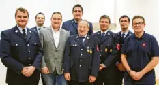  ?? Foto: Jürgen Schmidt ?? Sie haben bei der Feuerwehr Untermeiti­ngen das Sagen: (von links) Michael Erhard, Alexander Friedrich, Simon Schropp, Jürgen Pech, Heinrich Grashei, Martin Lauter, Stefan Süßmeier und Moritz Walter.