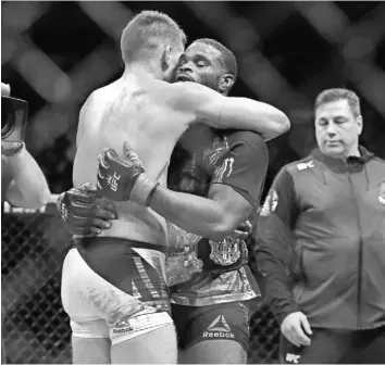  ?? ADAM HUNGER, USA TODAY SPORTS ?? Stephen Thompson, left, and Tyron Woodley fought to a draw at UFC 205 in November, above, and face each other again at UFC 209 on Saturday in Las Vegas.