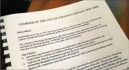  ?? FILE PHOTO ?? The current Saratoga Springs city charter is shown. On Tuesday, voters will decide whether to adopt a new charter, which would transform Saratoga Springs’ government. The issue has been a contentiou­s one this election season.