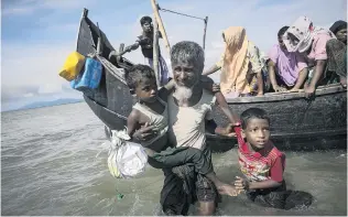  ?? PHOTO: GETTY IMAGES ?? Escape . . . Rohingya refugees continue to make perilous journeys into Bangladesh to escape a military crackdown on their villages in the western state of Rakhine in Myanmar.