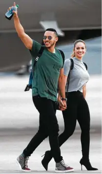  ?? Marie D. De Jesús / Houston Chronicle ?? Astros shortstop Carlos Correa returns to George Bush Interconti­nental Airport from Los Angeles with his fiancee, former Miss Texas USA Daniella Rodriguez, a day after the World Series win.