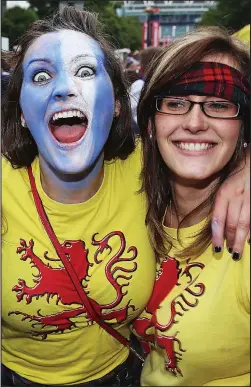  ??  ?? Tartan barmy: Scotland fans have been known to enjoy a party