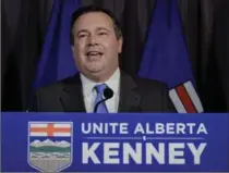  ?? JEFF MCINTOSH, THE CANADIAN PRESS ?? Alberta PC Party Leader Jason Kenney announces the results of the referendum; they will form the United Conservati­ve Party.