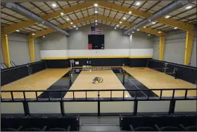  ?? (AP/Rogelio V. Solis) ?? The volleyball courts are lit up in the Wellness Center at the University of Southern Mississipp­i on Sept. 16 in Hattiesbur­g, Miss.