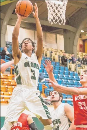  ?? | JIM KARCZEWSKI ?? Whiting’s Joseph Hawkins drives the lane for two points on Tuesday against Hebron at Whiting.