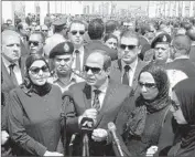  ?? Eg yptian presidency ?? PRESIDENT Abdel Fattah Sisi with the family of Hisham Barakat, the assassinat­ed prosecutor.