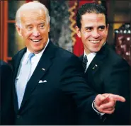  ?? (File Photo/AP/Charles Dharapak) ?? Then Vice President-elect Sen. Joe Biden (left) stands Jan. 6, 2009, with his son Hunter during a reenactmen­t of the Senate oath ceremony in the Old Senate Chamber on Capitol Hill in Washington.