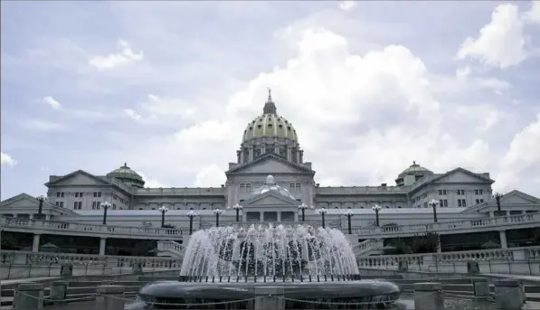  ?? Matt Rourke/Associated Press ?? The state Capitol in Harrisburg, where the Legislatur­e has been ordered to adopt a new congressio­nal district map by Friday.