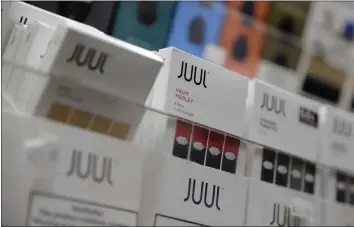  ?? ASSOCIATED PRESS ARCHIVES ?? Federal health authoritie­s say vaping giant Juul Labs illegally promoted its electronic cigarettes as a safer option to smoking, including it in a presentati­on to school children. The Food and Drug Administra­tion issued a stern warning to the company Monday, flagging various claims by Juul and asking for internal documents.