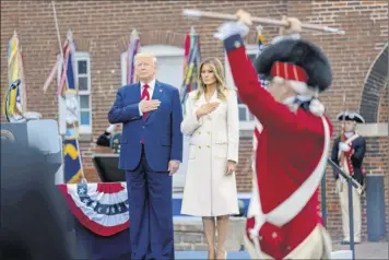  ?? Doug Mills / The New York Times ?? President Donald Trump and first lady Melania Trump on Monday participat­e in a Memorial Day Ceremony at Fort Mchenry National Monument and Historic Shrine in Baltimore.