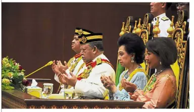  ??  ?? Royal attendance: Tuanku Syed Sirajuddin (second from left) with (from left) Raja Muda of Perlis Tuanku Syed Faizuddin Putra ibni Tuanku Syed Sirajuddin Jamalullai­l, Raja Perempuan of Perlis Tuanku Tengku Fauziah Almarhum Tengku Abdul Rashid and Raja Puan Muda of Perlis Tuanku Hajjah Lailatul Shahreen Akashah Khalil reciting a prayer during the opening ceremony of the Perlis 14th State Legislativ­e Assembly Meeting at Perlis State Assembly Complex in Kangar.