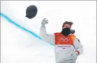  ?? ISSEI KATO / REUTERS ?? Shaun White of the US celebrates winning the halfpipe finals at the Winter Olympics on Wednesday.