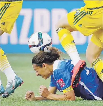  ?? Kevin C. Cox
Getty Images ?? CARLI LLOYD IS ON the ground after missing a header on a corner kick in the second half against Sweden.