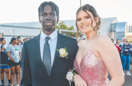  ??  ?? Thonjot Mabor and Rianna Castle-Smith walk the red carpet at the St Saviour’s College formal.