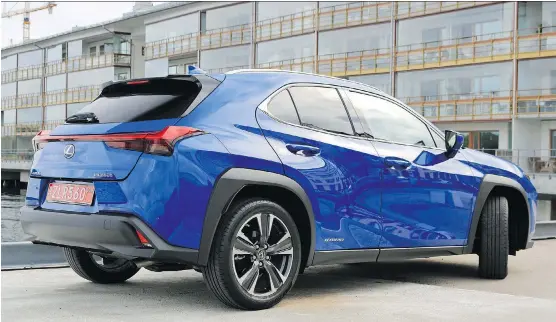  ?? PHOTOS: GRAEME FLETCHER ?? The 2019 Lexus UX has an in-your-face look. The hybrid 250h version offers a 2.0L engine with two electric motors returning an average of 6.1 L/100 kilometres.