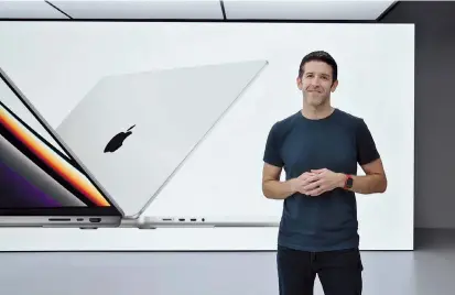  ?? ?? Apple’s John Ternus introduces the MacBook Pro with the new M1 Pro and M1 Max chips, available in 14- and 16-inch models during a special event at Apple Park in Cupertino in California. — Reuters