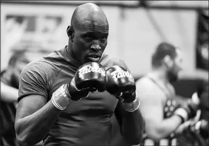  ?? BRIAN RAMOS ?? Sadibou Sy trains Monday at Xtreme Couture in Las Vegas. He is slated to fight Josh Silveira tonight at The Theatre at Virgin Hotels. Sy, a former welterweig­ht, is moving up to the light heavyweigh­t division as the Profession­al Fighter League kicks off its 2024 season. Sy won the 2022 PFL season’s 170-pound division’s championsh­ip and accompanyi­ng $1 million prize. He looks to add to the success with a new title in the 205pound division.