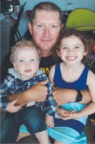  ?? Picture: SUPPLIED ?? AVOIDABLE: Former mine worker Robert Hodgson, pictured with his granddaugh­ter Katelyn, 6, and grandson Jayden, 3, was injured in a workplace accident in 2016.
