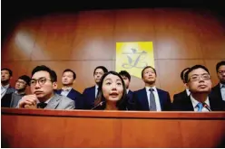  ??  ?? HONG KONG: Democratic­ally elected lawmaker, teacher Lau Siu-lai (C), from the ‘Democracy Groundwork’ party, holds a press conference with other lawmakers at the Legislativ­e Council (Legco). — AFP