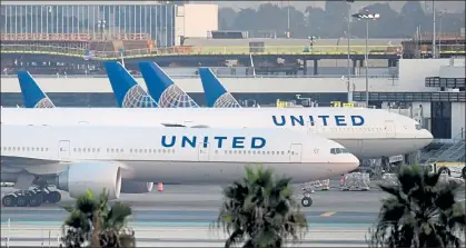  ?? FREDERIC J. BROWN / AFP ?? United Airlines aircraft are seen on the tarmac at Los Angeles Internatio­nal Airport earlier this month.
