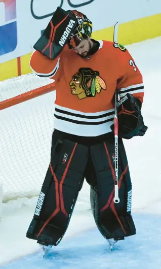  ?? MATT MARTON/AP ?? Blackhawks goaltender Petr Mrazek reacts after a second-period goal by the Jets on Sunday.