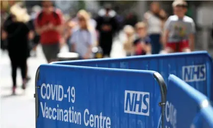  ?? Photograph: Andy Rain/EPA ?? Coronaviru­s passports require people to have proof of complete vaccinatio­n, negative test, or a Covid-19 recovery certificat­e, to access public venues and events, such as restaurant­s or concerts.