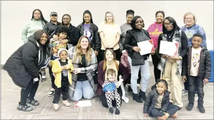  ?? Submitted Photo ?? Single parent students from St. Francis, Cross, Monroe and Prairie counties receive ASPSF spring 2024 scholarshi­ps. Also pictured is ASPSF Program Manager Marci Langston and Cross County volunteer Sherry Breckenrid­ge.