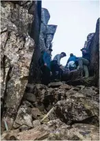  ??  ?? This scrambling ascent to Solomons Throne is a must-do 15-minute sidetrip accessed via a track off Walls of Jerusalem Track, at Damascus Gate.