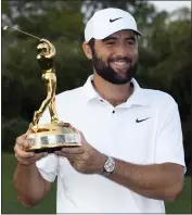  ?? LYNNE SLADKY — THE ASSOCIATED PRESS ?? Scottie Scheffler, holding The Players Championsh­ip trophy, has been No. 1in the world for the past 43weeks.
