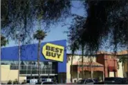  ?? AP PHOTO/JOHN LOCHER ?? In this May 23, 2017, photo, cars are parked in front of a Best Buy store in Las Vegas.