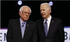  ?? Photograph: Matt Rourke/AP ?? Bernie Sanders and Joe Biden at a Democratic presidenti­al primary debate in Charleston, South Carolina, in February 2020.