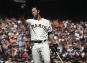  ?? JEFF CHIU - THE ASSOCIATED PRESS ?? FILE - In this Sunday, Sept. 29, 2019, file photo, San Francisco Giants’ Madison Bumgarner waves toward fans before pinch hitting against the Los Angeles Dodgers during the fifth inning of a baseball game in San Francisco.