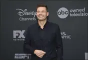  ?? EVAN AGOSTINI — INVISION, FILE ?? Ryan Seacrest will return to New York’s Times Square to host “Dick Clark New Year’s Rockin’ Eve.”