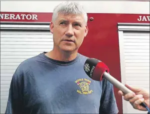  ?? LAURA JEAN GRANT/CAPE BRETON POST ?? Middle River Fire Department Chief David MacKenzie spoke to the media Sunday morning following the crash of an ultralight plane in the community Saturday evening.