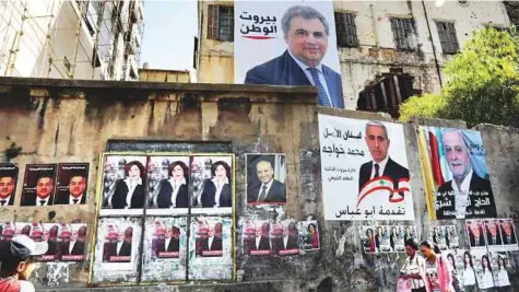  ?? AFP ?? Campaign posters in Beirut. The new electoral system, the frustratio­n of young voters and the candidacy of scores of independen­ts have sparked hope for something different in the May 6 elections.