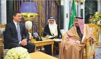  ?? Reuters ?? Saudi Arabia’s King Salman Bin Abdul Aziz Al Saud with Alexander Novak in Riyadh yesterday. Russian banks are keen to take part in Aramco’s initial public offering.