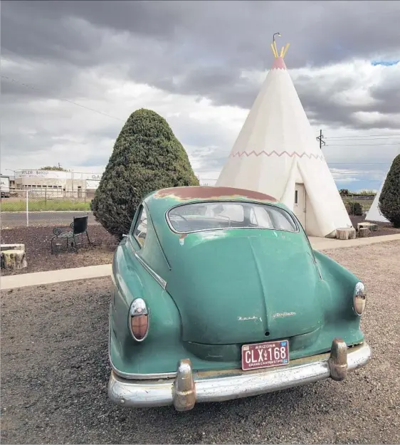  ??  ?? THE WIGWAM HOTEL in Holbrook, Ariz., lies near Route 66, which was establishe­d in 1926. The fabled route’s decline began with the birth of the interstate system.