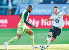  ?? AFP ?? Celtic’s Olivier Ntcham (left) and Rosenborg’s Anders Trondsen vie for the ball at the Lerkendal Stadium.