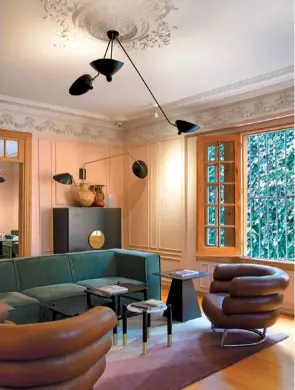  ??  ?? Below: A lounge area at Ignacia Guest House, which inhabits a converted town house in the style-centric neighbourh­ood of Roma.