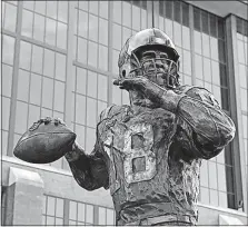  ?? [DARRON CUMMINGS/THE ASSOCIATED PRESS] ?? Peyton Manning said as his statue unveiling: “”I’m not sure you’re supposed to be alive to see something like this.”