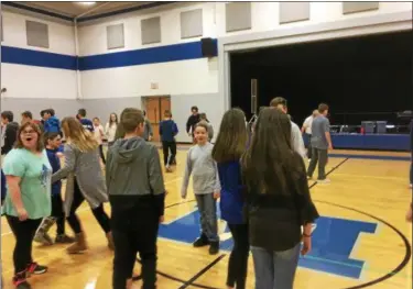  ?? ZACHARY SRNIS — THE MORNING JOURNAL ?? Midview Middle School students dance during Spring Fling in school’s gymnasium.