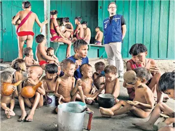  ?? ?? The Yanomami tribe is suffering from poisoning as a result of water contaminat­ion from illegal logging and mining in the Amazon