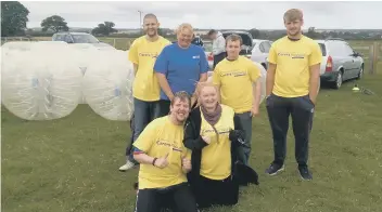  ??  ?? Young Adult Carer team at the Bubble Football event organised by Moneyweb Ltd.