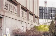  ?? MARK MIRKO/HARTFORD COURANT ?? The decaying data processing center is just to the east of Dunkin’ Donuts Park in downtown Hartford.