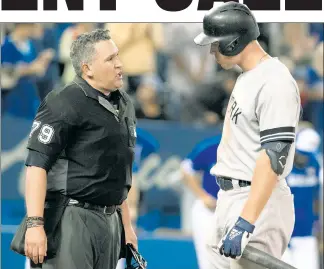  ?? AP ?? EXCUSE ME? Aaron Judge talks with home plate umpire Manny Gonzalez after striking out looking to end the Yankees’ 6-4 loss to the Blue Jays on Sunday.