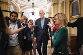  ?? ERIN SCHAFF / THE NEW YORK TIMES ?? U.S. Sen. John Cornyn, R-Texas, told reporters Monday, “I don’t think we should be taking a former KGB colonel’s word for what their intelligen­ce apparatus is doing or not doing. I believe our intelligen­ce community.”