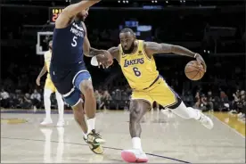  ?? AP file photo ?? LeBron James needs 1,326 more points to pass Kareem Abdul-Jabbar as the NBA’s all-time leading scorer. At his career pace of 27.1 points per game, James is 49 games away from becoming No. 1.