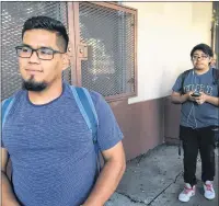  ?? AMY TAXIN/AP PHOTO ?? Oscar Gaytan waits in line to renew his work permit under an expiring Obama-era program for immigrants brought to the country as children. After Oct. 5, no one else can renew under the program that has let nearly 800,000 immigrants brought to the...